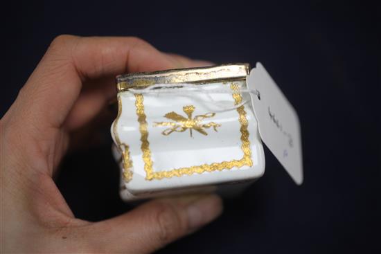 A late 18th / early 19th century French gilt metal mounted commode shaped white enamel snuff box, 3in.